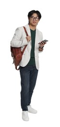 Photo of Handsome Asian man in glasses with smartphone and backpack on white background