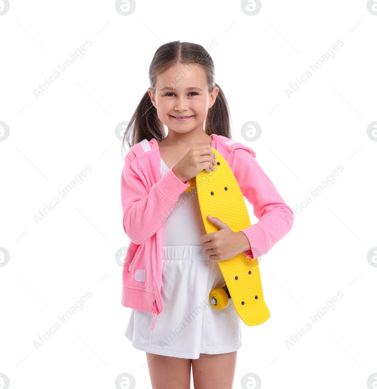 Little girl with penny board on white background Photo of Little girl with penny board on white background