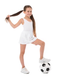 Photo of Little girl with soccer ball on white background