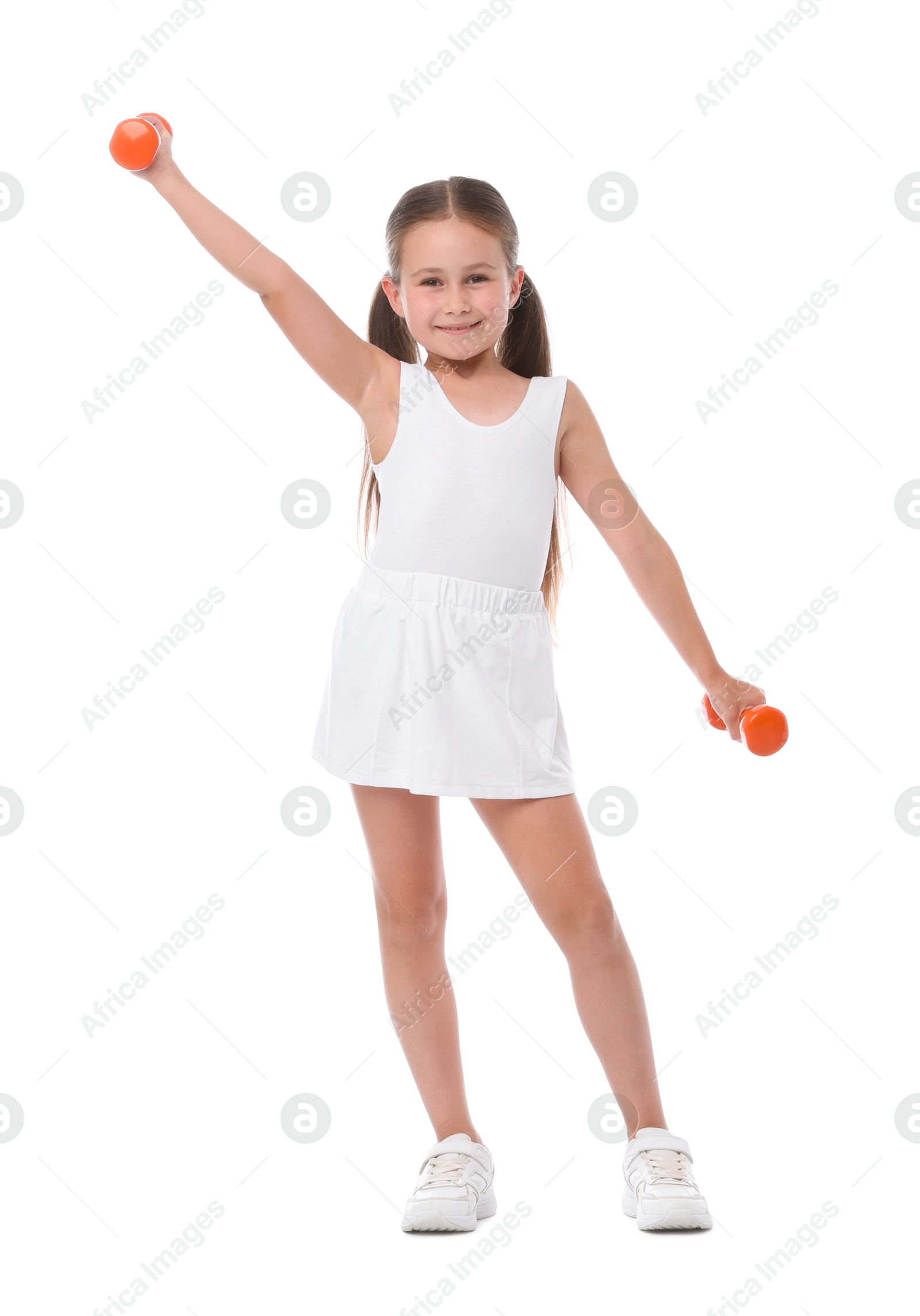 Little girl with dumbbells on white background Photo of Little girl with dumbbells on white background