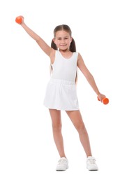 Photo of Little girl with dumbbells on white background