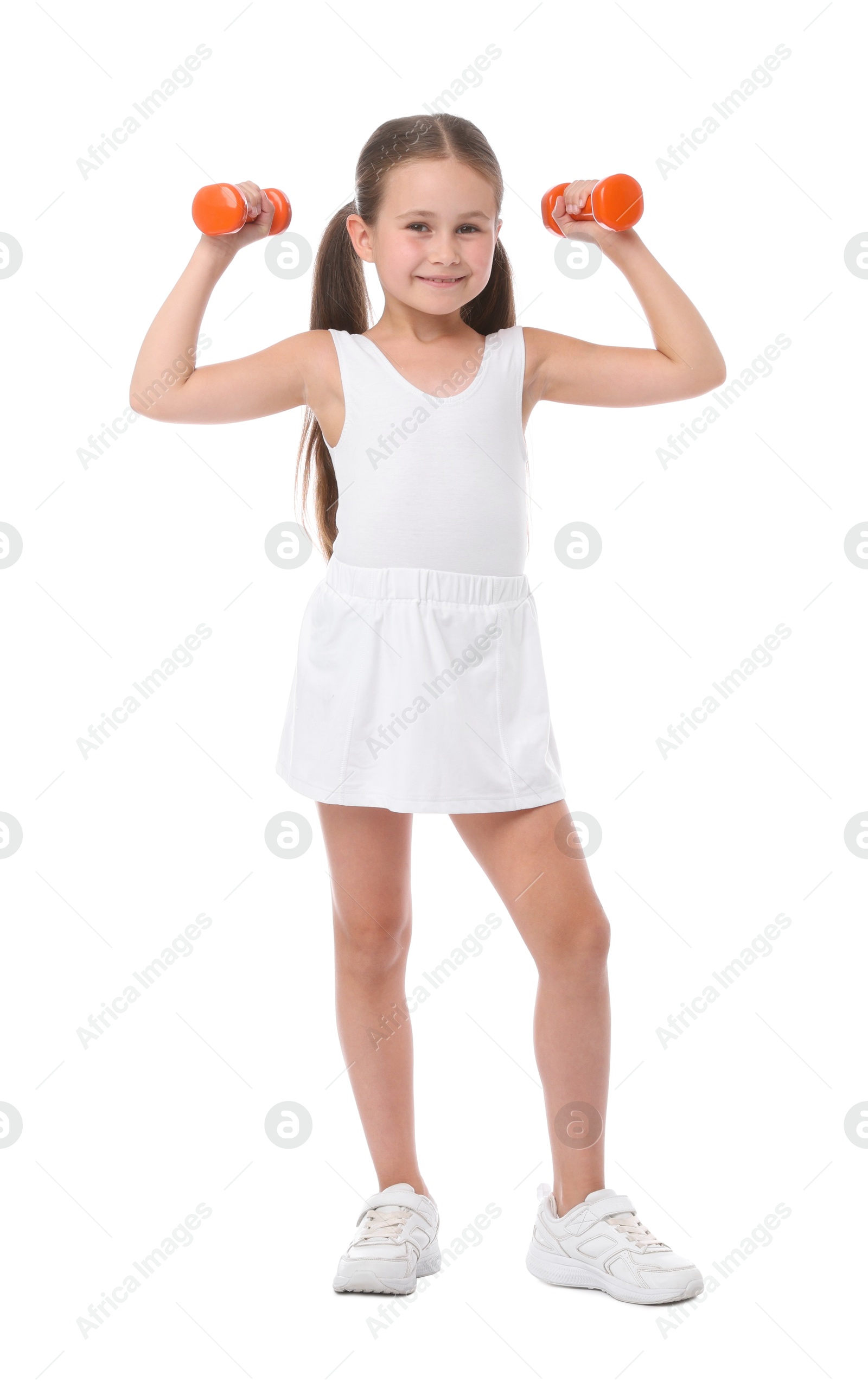 Little girl with dumbbells on white background Photo of Little girl with dumbbells on white background
