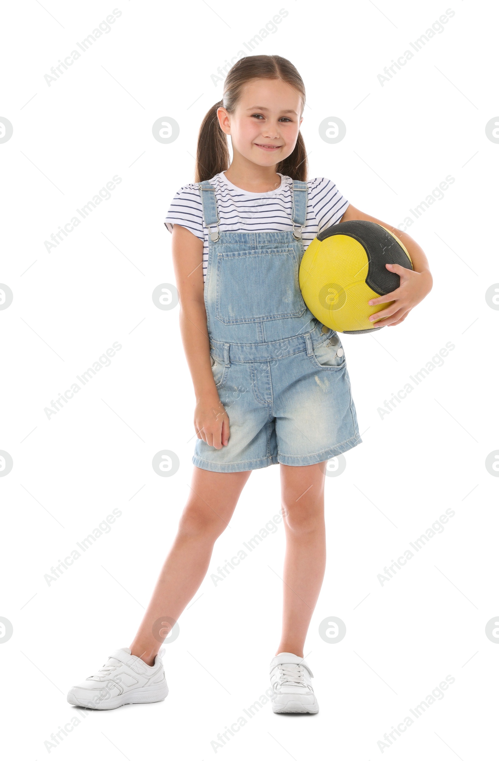 Little girl with medicine ball on white background Photo of Little girl with medicine ball on white background