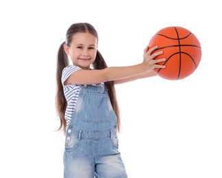 Photo of Little girl with basketball ball on white background