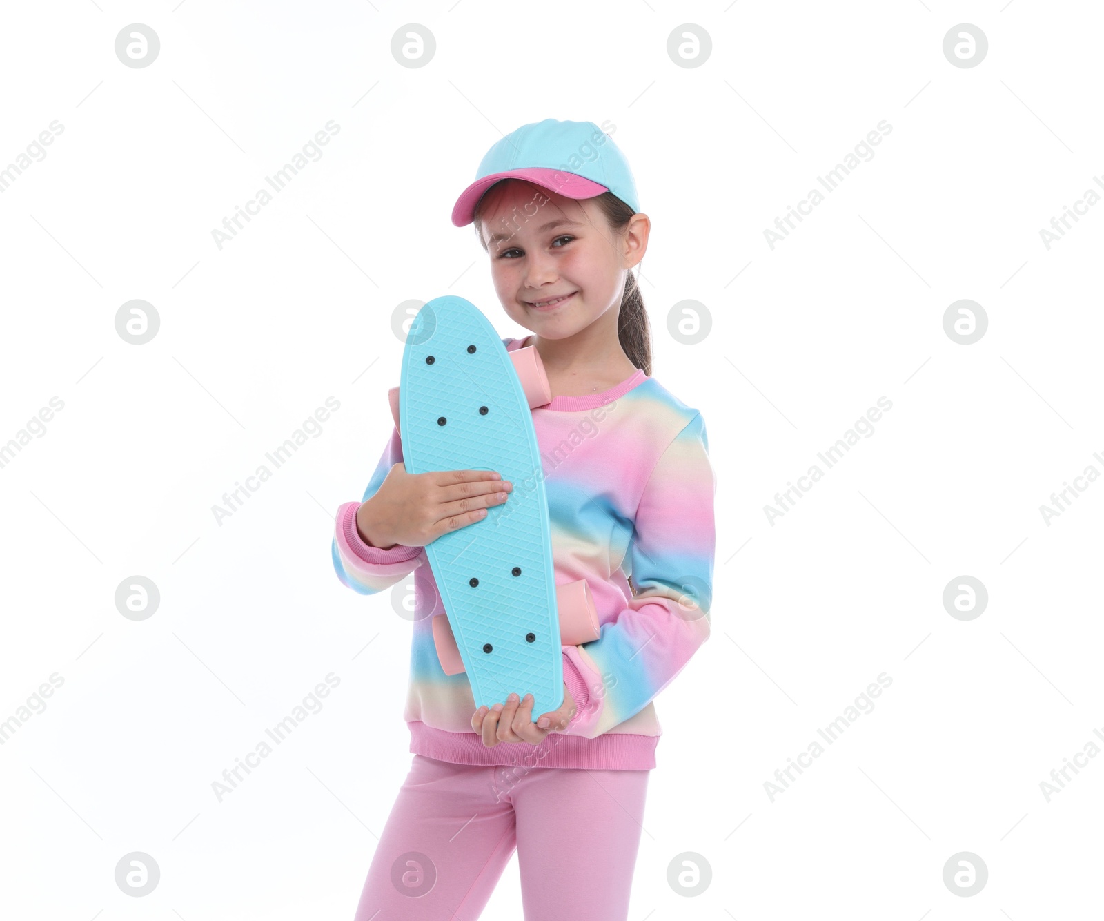 Little girl with penny board on white background Photo of Little girl with penny board on white background