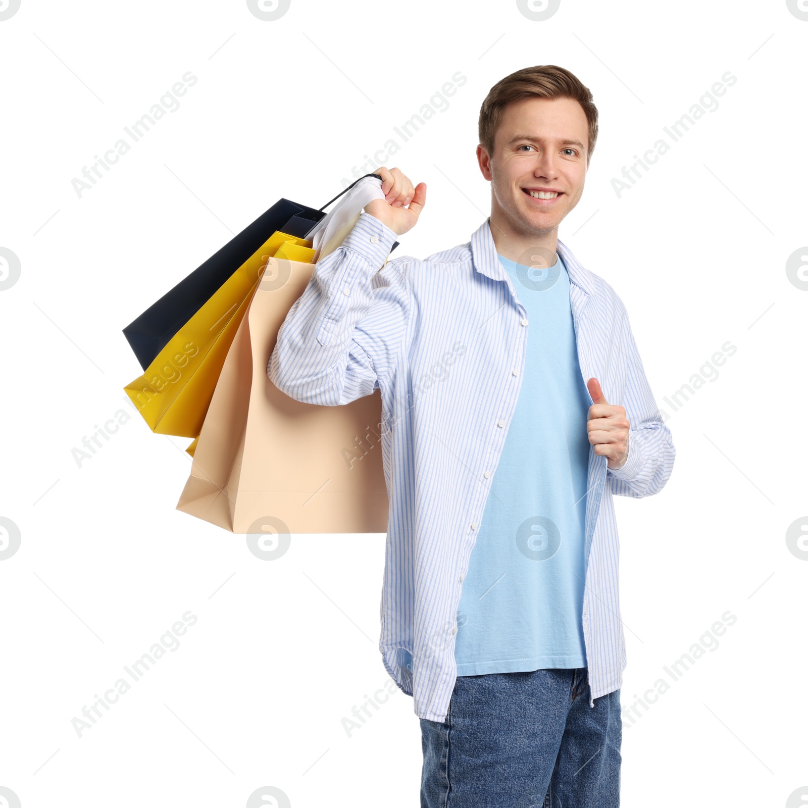 Cheerful man with shopping bags on white background Photo of Cheerful man with shopping bags on white background