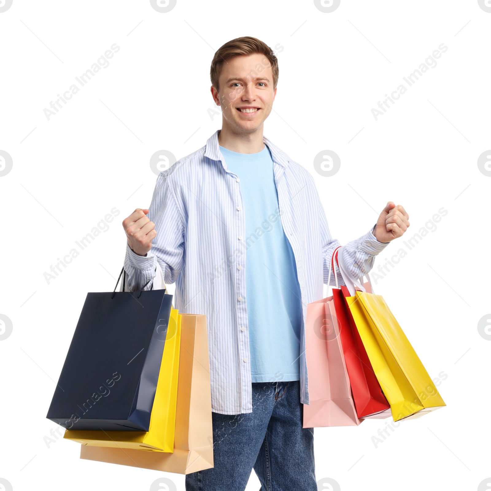 Cheerful man with shopping bags on white background Photo of Cheerful man with shopping bags on white background