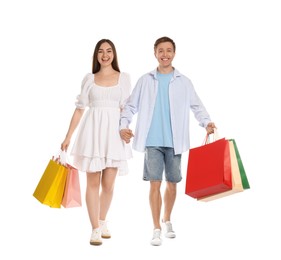 Photo of Happy couple with shopping bags on white background