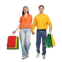 Photo of Happy couple with shopping bags on white background