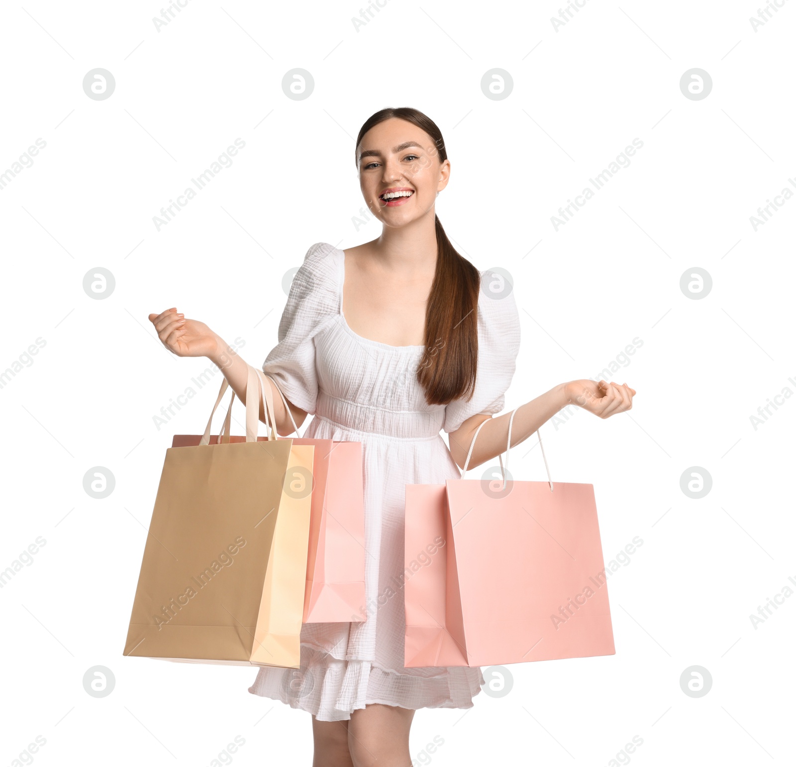Positive woman with shopping bags on white background Photo of Positive woman with shopping bags on white background