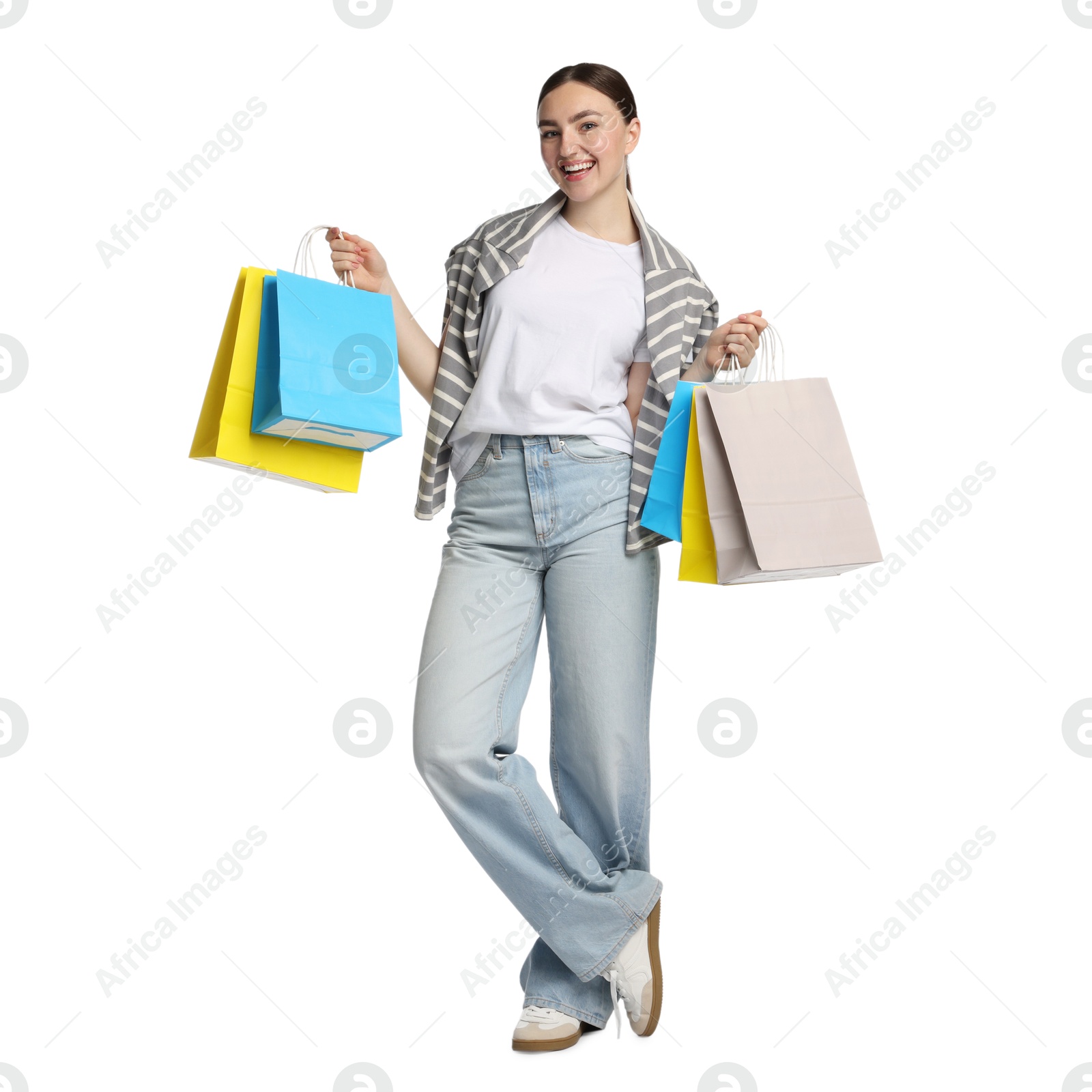 Positive woman with shopping bags on white background Photo of Positive woman with shopping bags on white background