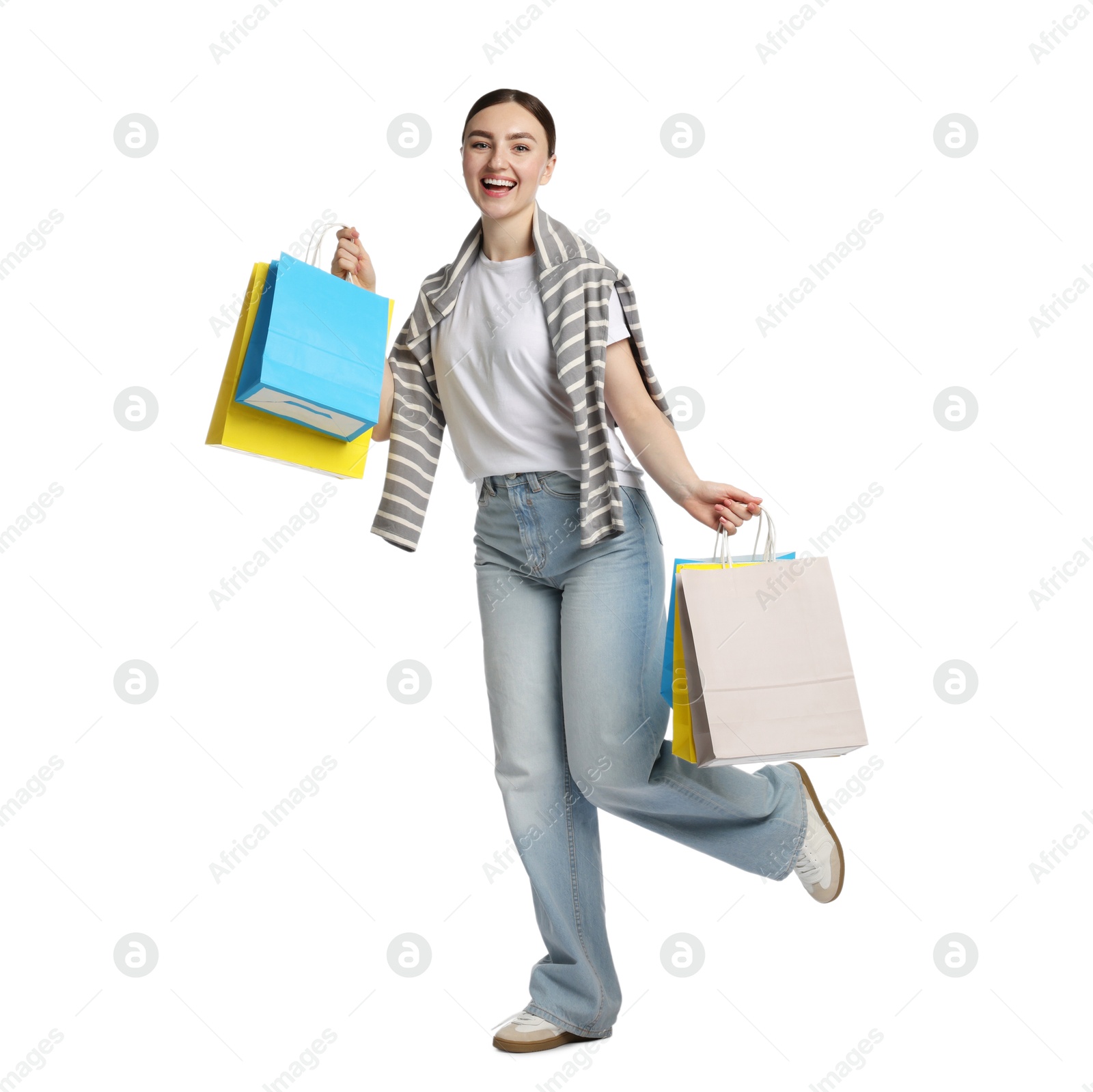Positive woman with shopping bags on white background Photo of Positive woman with shopping bags on white background