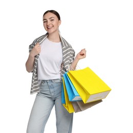 Photo of Positive woman with shopping bags on white background