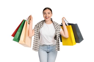 Photo of Excited woman with shopping bags on white background