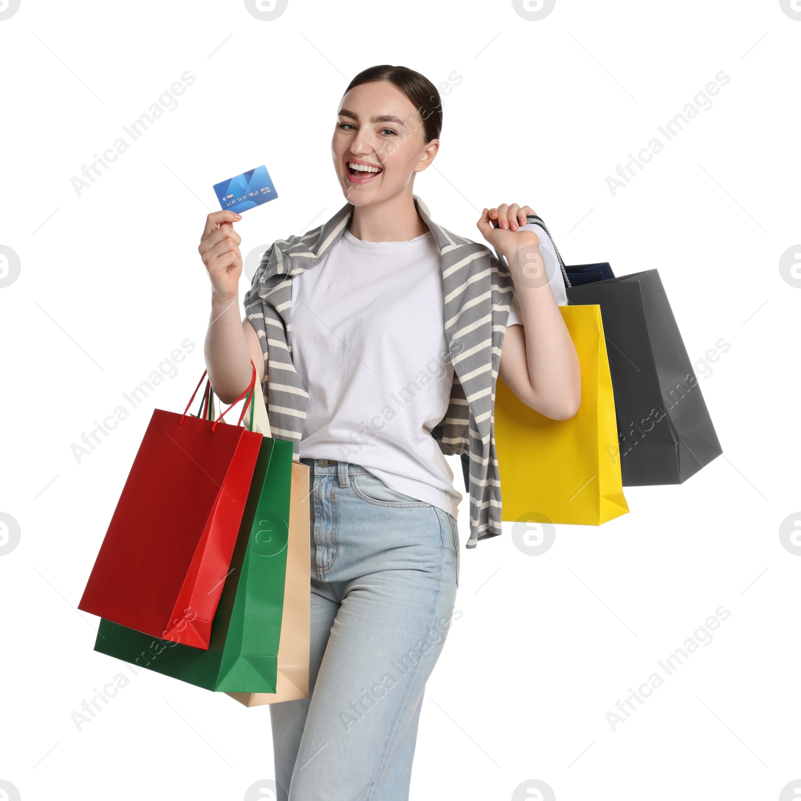 Positive woman with credit card and shopping bags on white background Photo of Positive woman with credit card and shopping bags on white background
