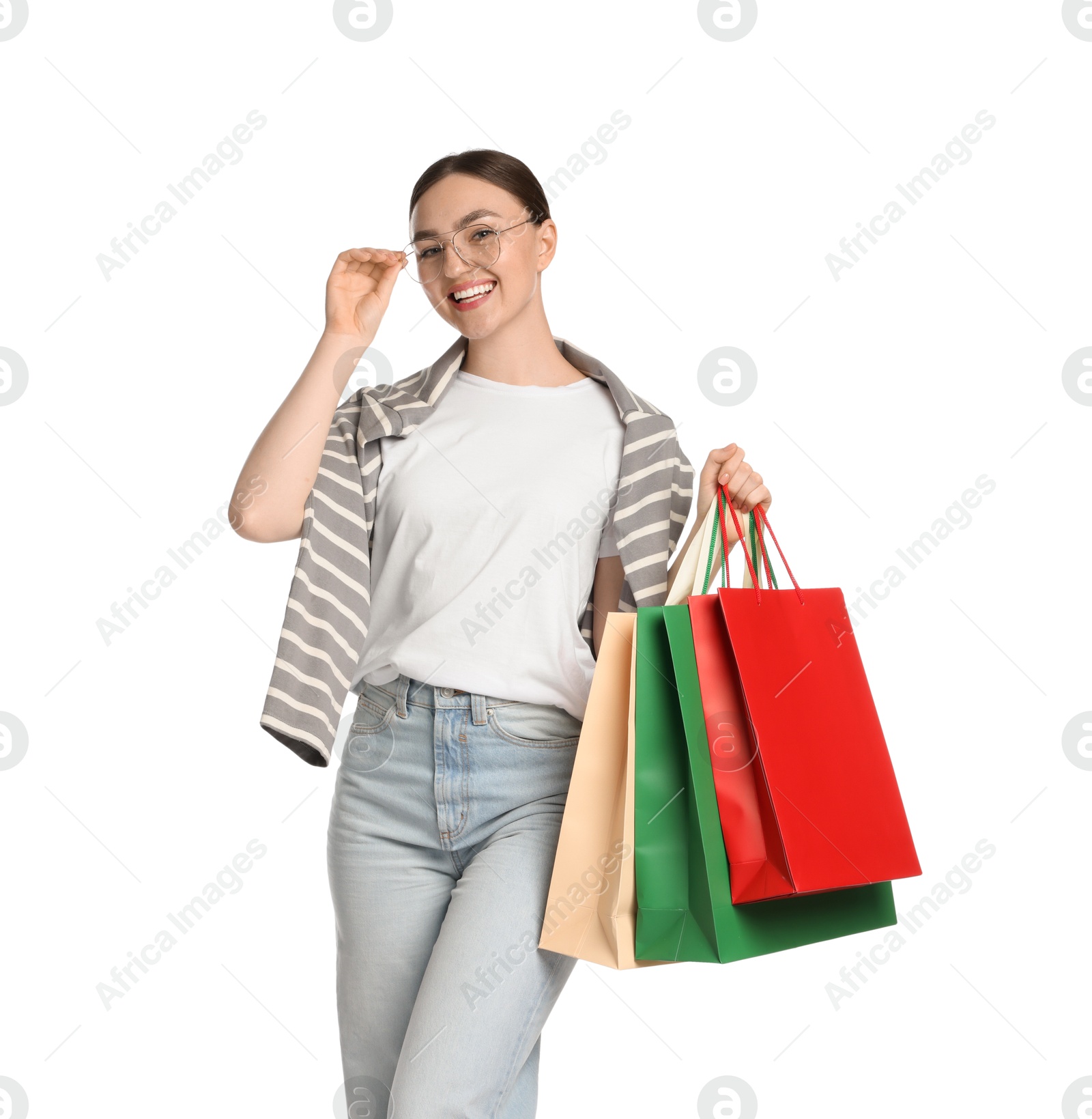 Positive woman with shopping bags on white background Photo of Positive woman with shopping bags on white background