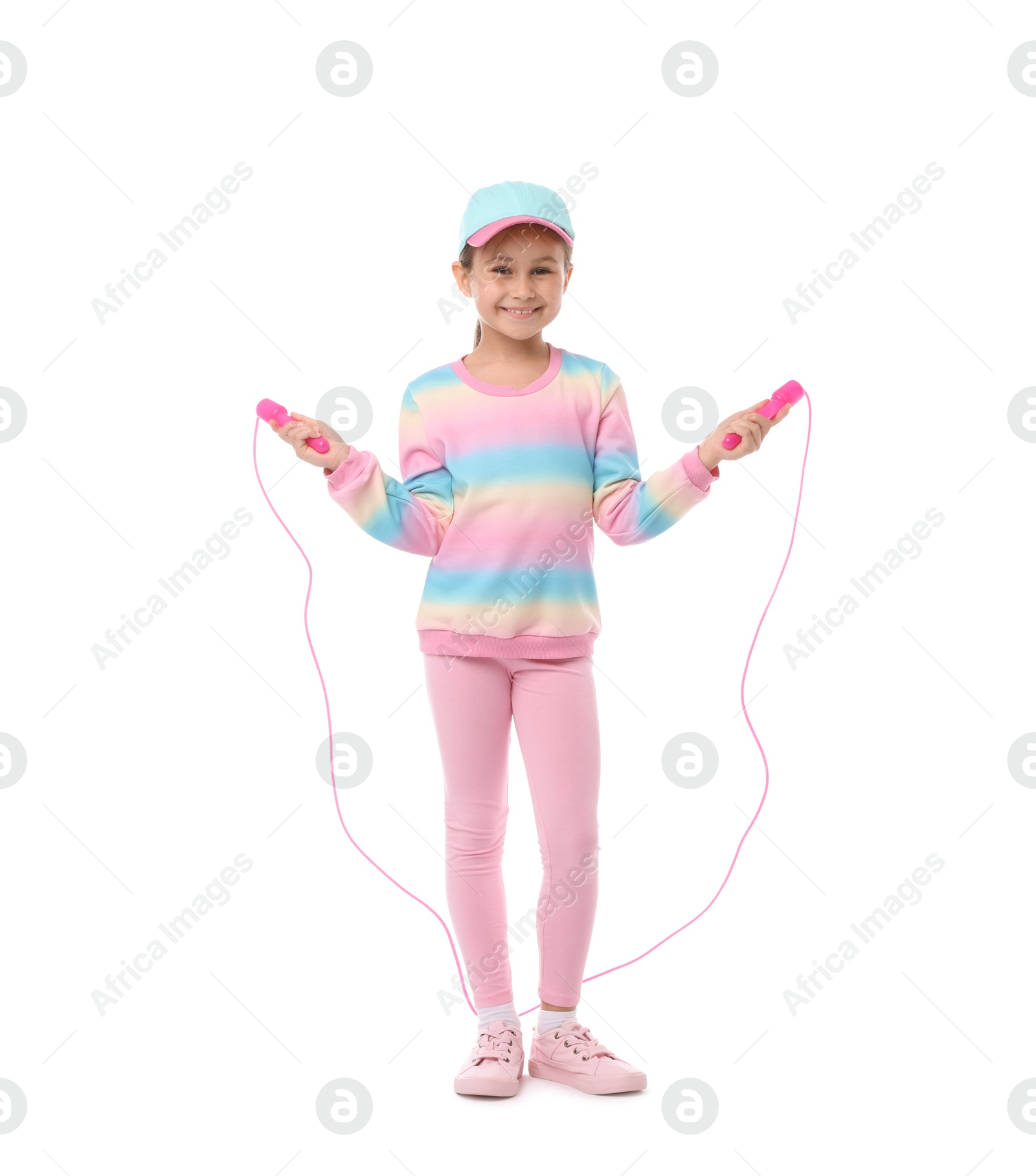 Little girl with skipping rope on white background Photo of Little girl with skipping rope on white background