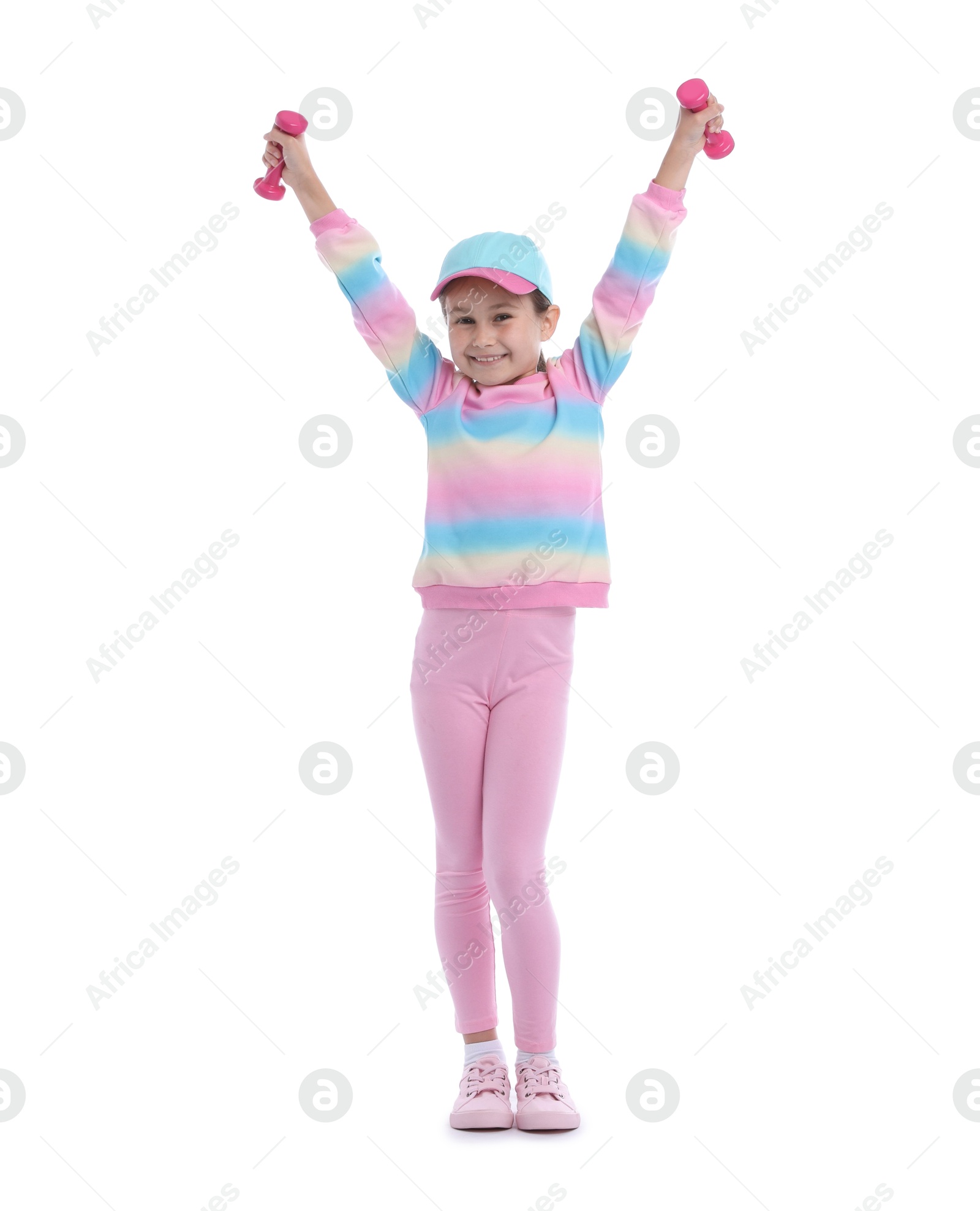 Little girl with dumbbells on white background Photo of Little girl with dumbbells on white background