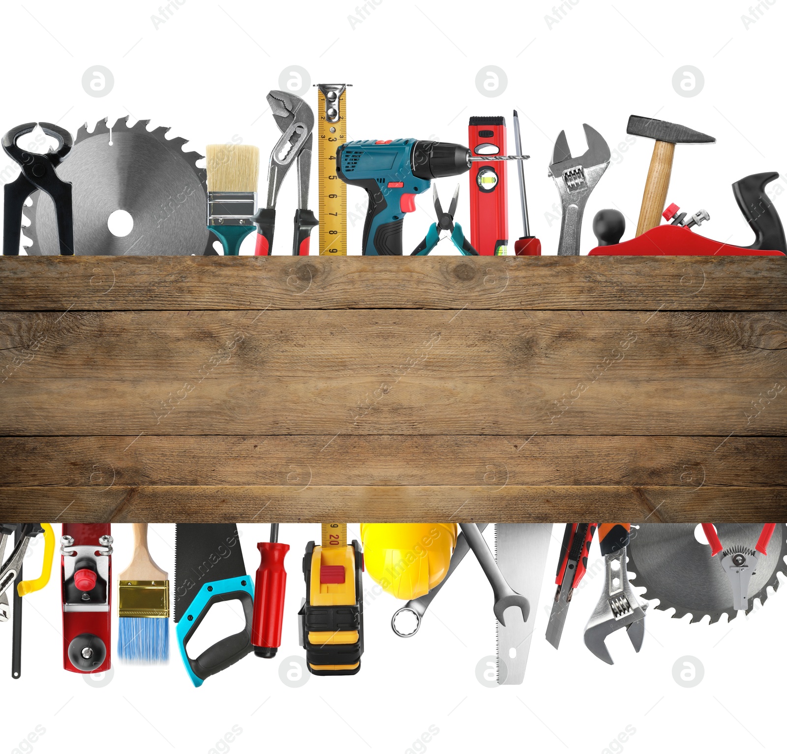 Saws and other equipment sticking out of wooden board on white background, set Image of Saws and other equipment sticking out of wooden board on white background, set
