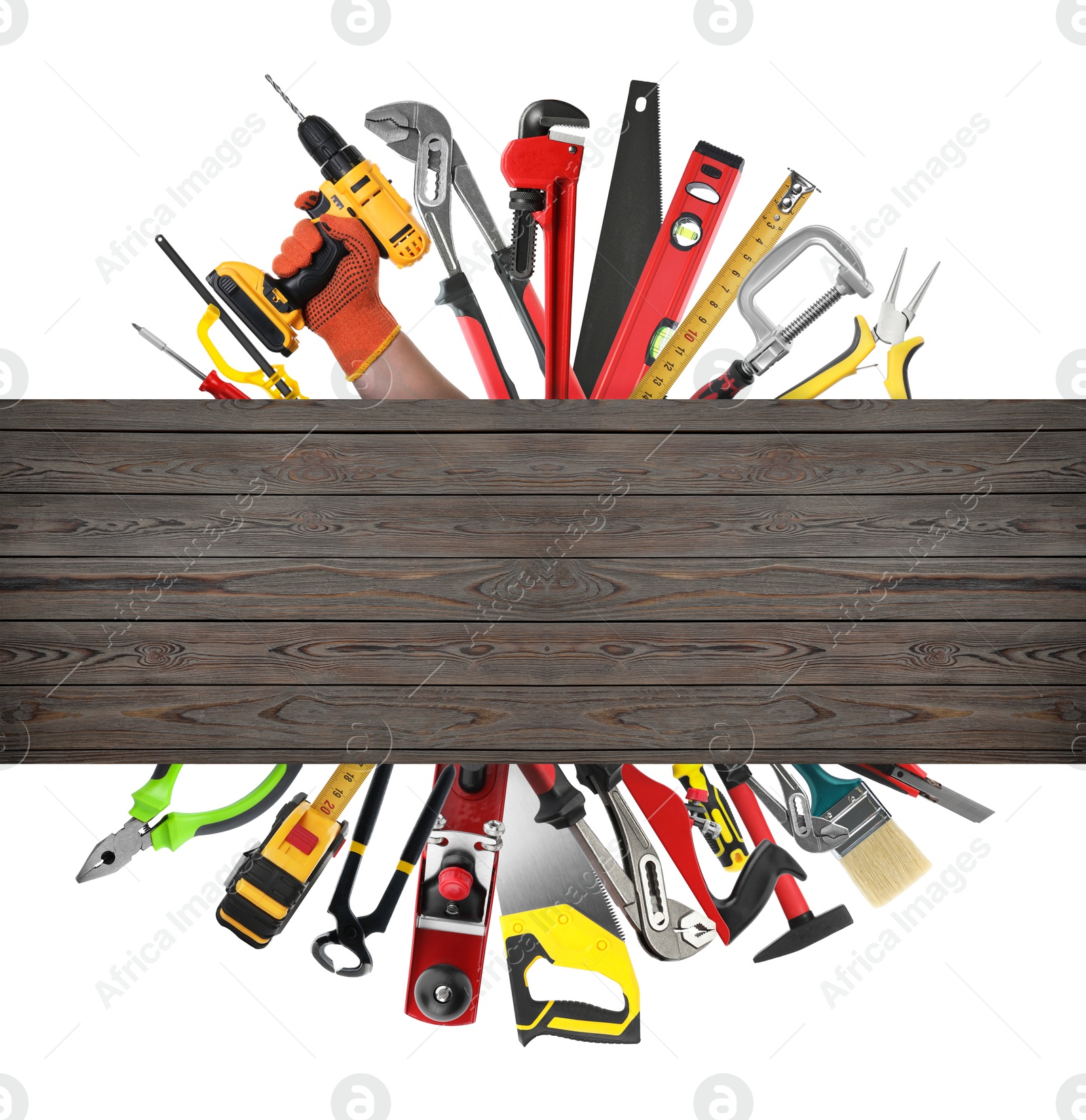 Saws and other equipment sticking out of wooden board on white background, set Image of Saws and other equipment sticking out of wooden board on white background, set