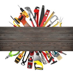 Image of Saws and other equipment sticking out of wooden board on white background, set