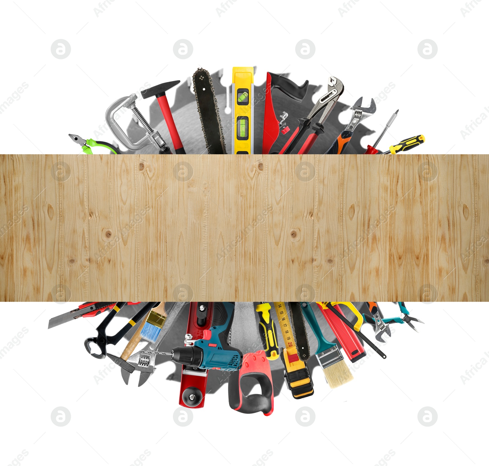 Saws and other equipment sticking out of wooden board on white background, set Image of Saws and other equipment sticking out of wooden board on white background, set