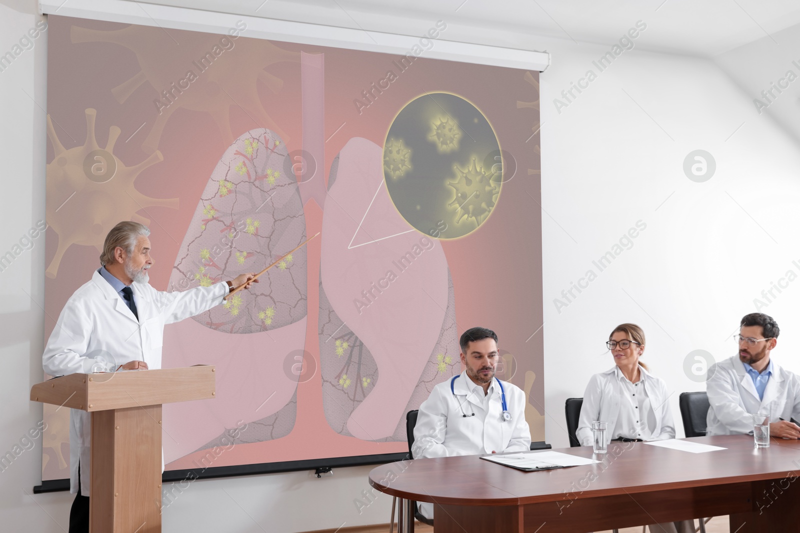 Healthcare professional giving lecture about lung diseases in conference room using video projector. Illustration on projection screen Image of Healthcare professional giving lecture about lung diseases in conference room using video projector. Illustration on projection screen