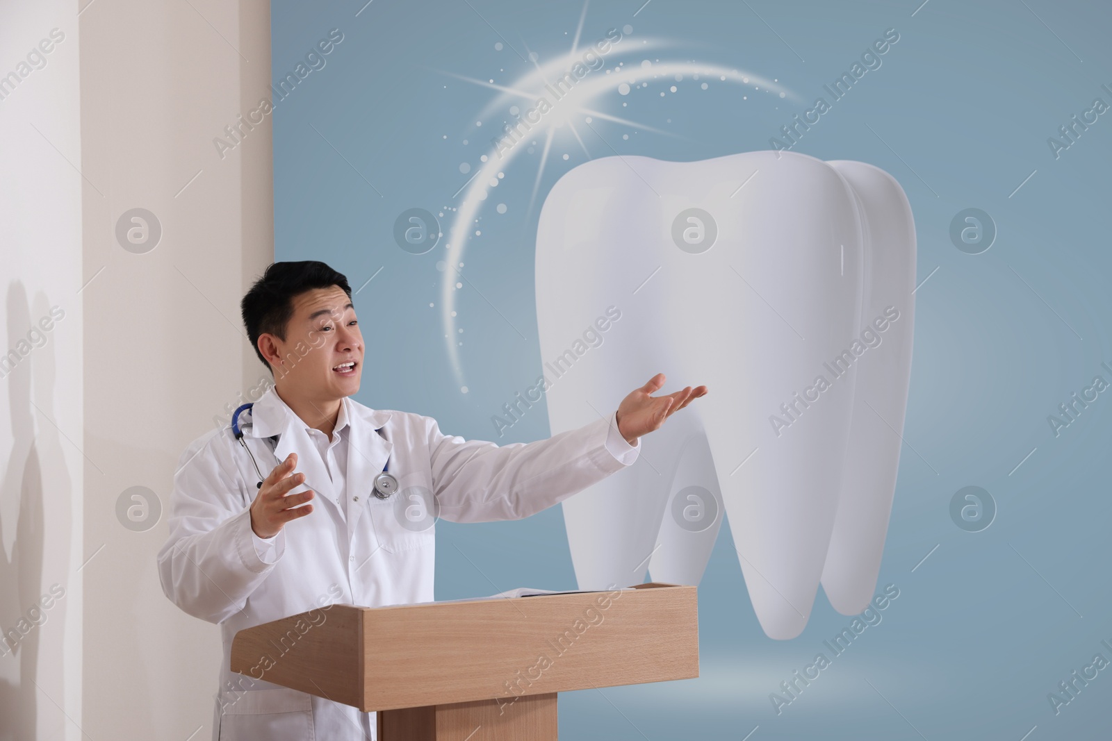 Image of Healthcare professional giving lecture about dentistry in conference room using video projector. Illustration on projection screen