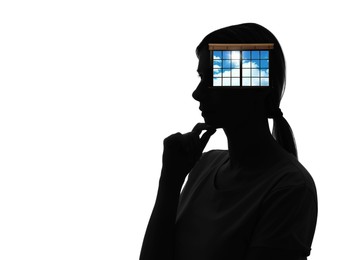 Image of Mental health. Silhouette of woman with window in head on white background