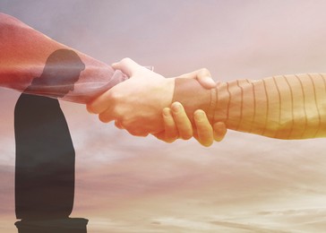 Image of Mental health, psychologist services. Giving helping hand, silhouette of man and sunrise sky, multiple exposure