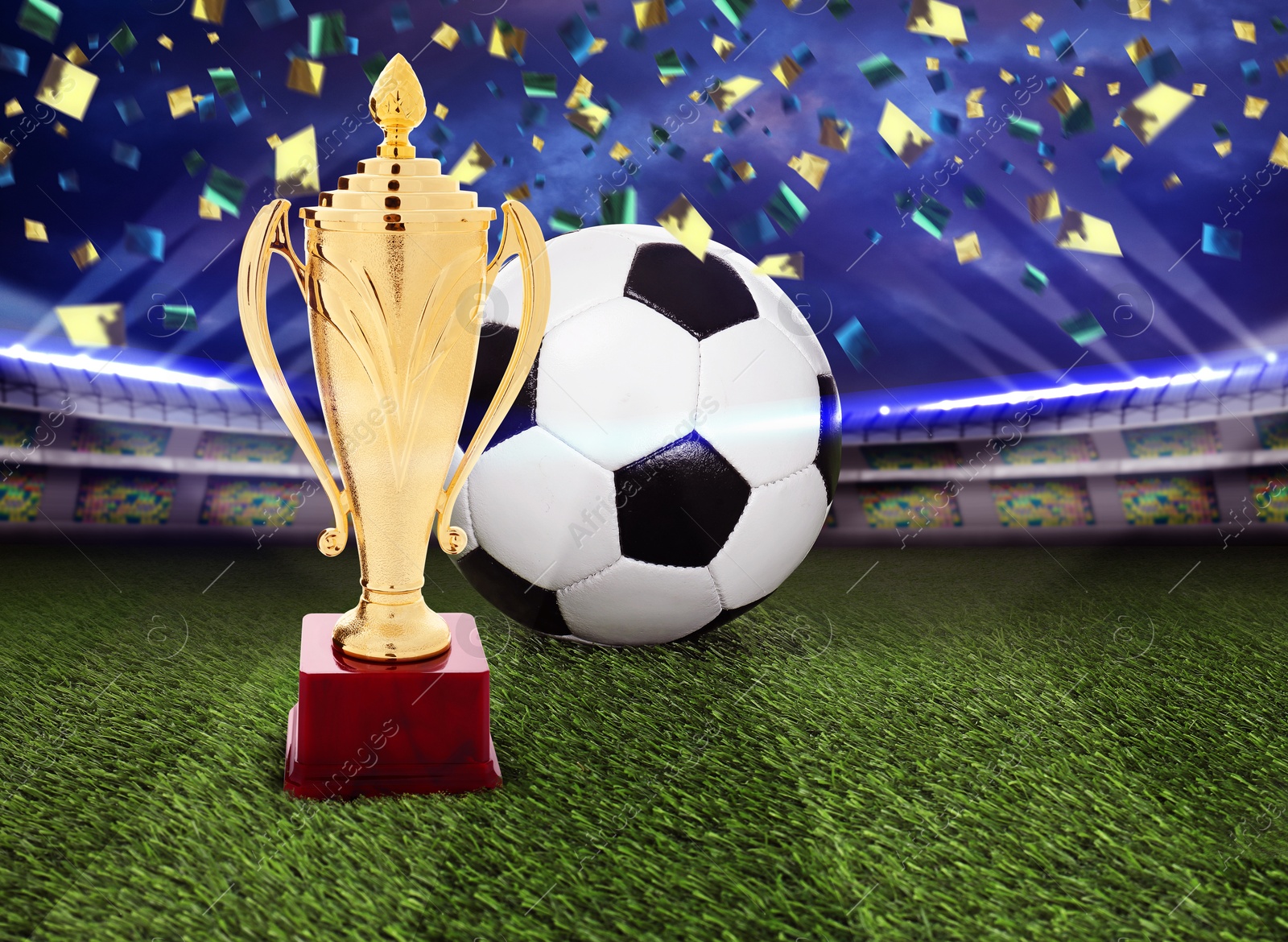 Football championship. Shiny golden trophy cup and soccer ball under falling confetti on stadium Image of Football championship. Shiny golden trophy cup and soccer ball under falling confetti on stadium