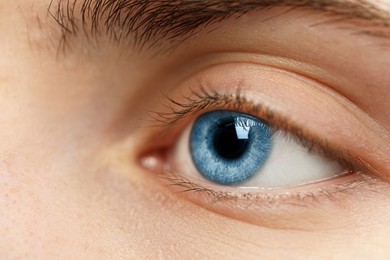 Image of Closeup view of woman with blue eyes