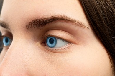 Image of Closeup view of woman with blue eyes