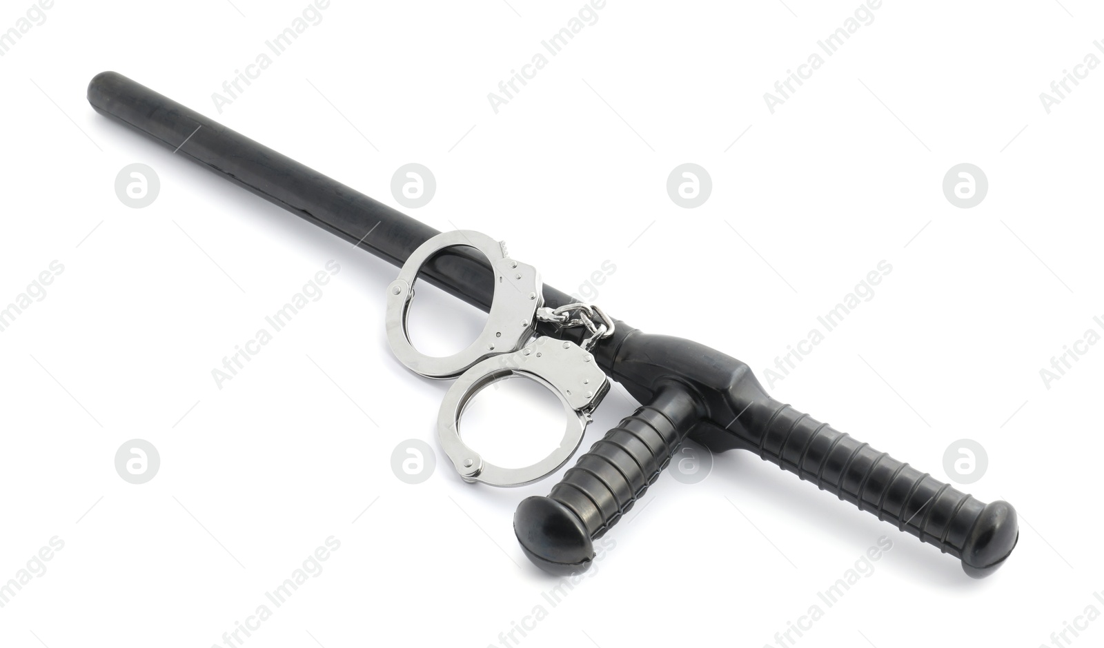 Police baton and handcuffs on white background Photo of Police baton and handcuffs on white background
