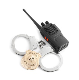 Photo of Police badge, handcuffs and walkie talkie on white background, above view