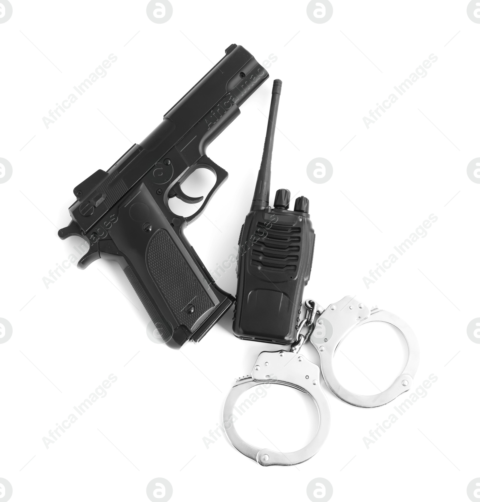 Gun, handcuffs and walkie talkie on white background, top view. Police equipment Photo of Gun, handcuffs and walkie talkie on white background, top view. Police equipment