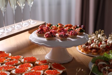 Photo of Buffet menu. Many different appetizers on table, closeup