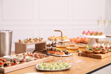 Photo of Buffet menu. Many different appetizers on table, closeup. Space for text
