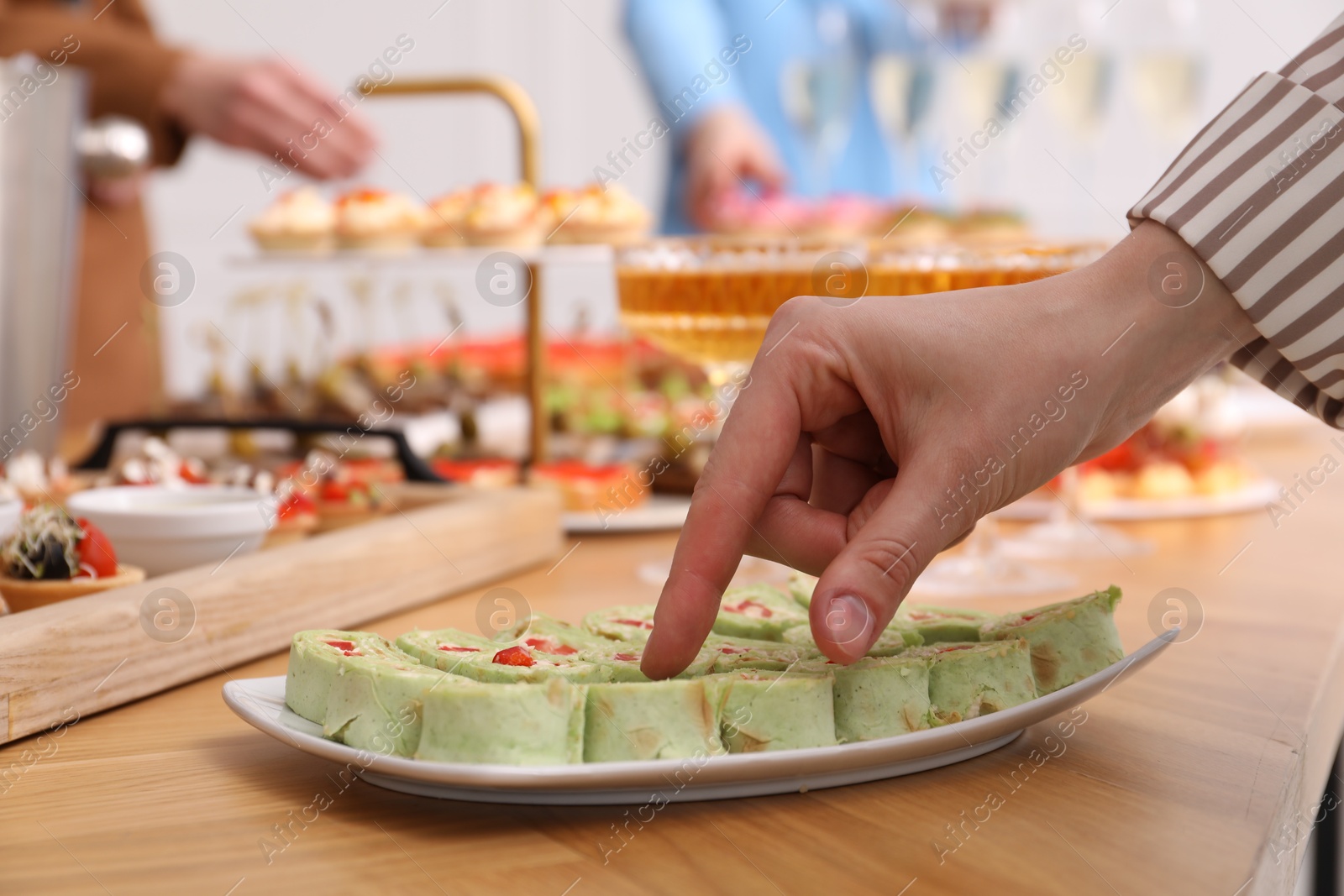People with different appetizers at buffet, selective focus Photo of People with different appetizers at buffet, selective focus