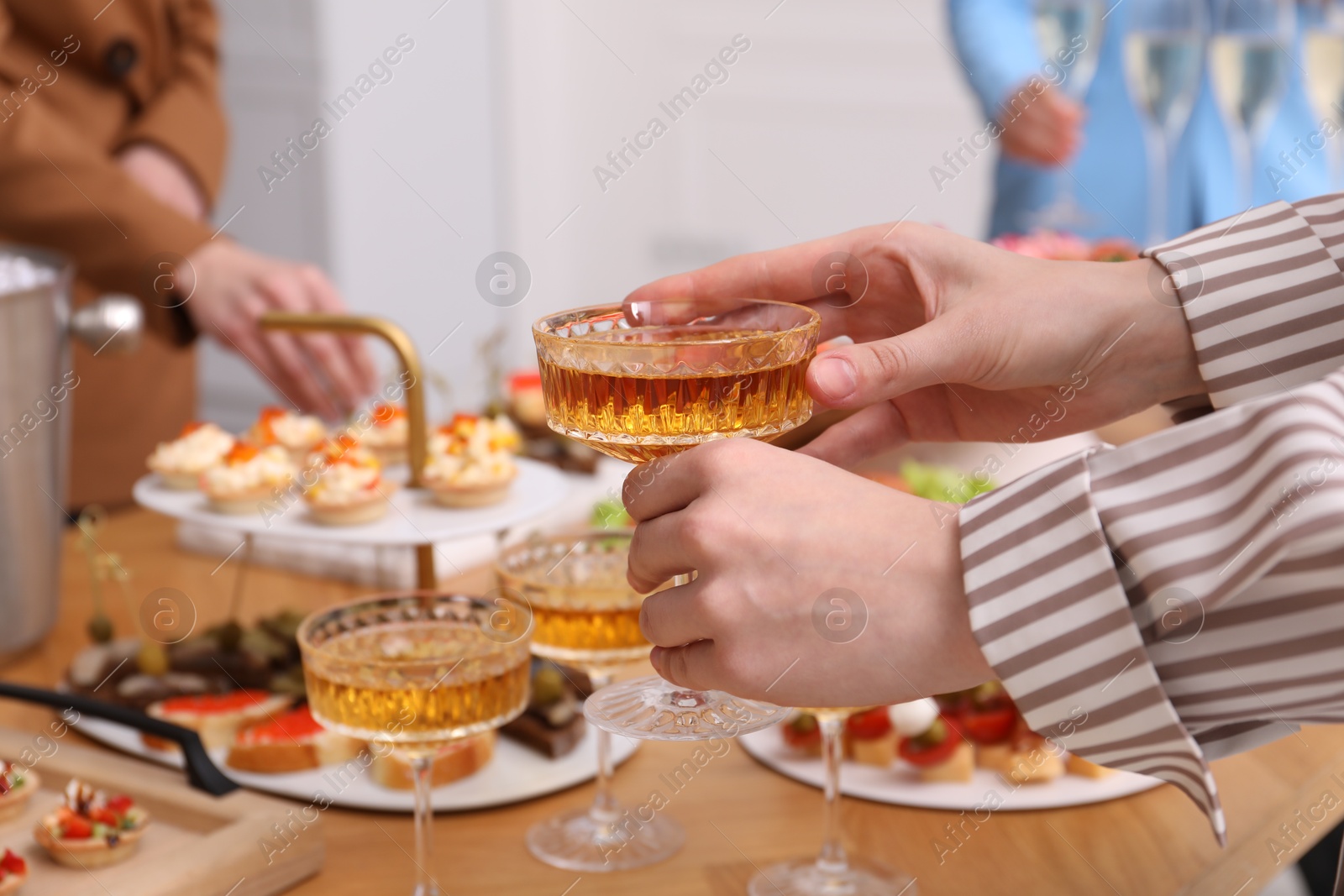 People with different appetizers at buffet, selective focus Photo of People with different appetizers at buffet, selective focus