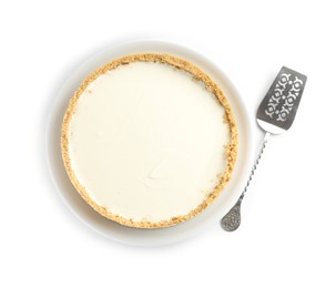 Photo of Tasty cheesecake and server isolated on white, top view