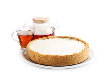 Photo of Tasty cheesecake and tea isolated on white