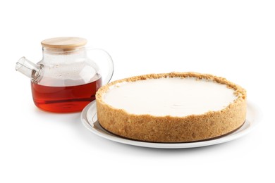 Photo of Tasty cheesecake and tea isolated on white
