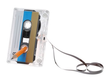 Photo of Rewinding audio cassette with pencil isolated on white