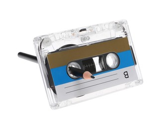 Photo of Rewinding audio cassette with pencil isolated on white