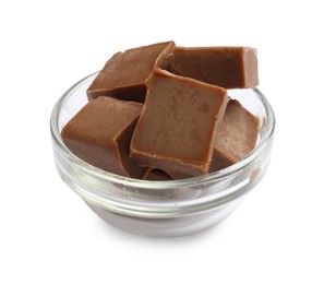 Photo of Tasty chocolate butter cubes in bowl isolated on white