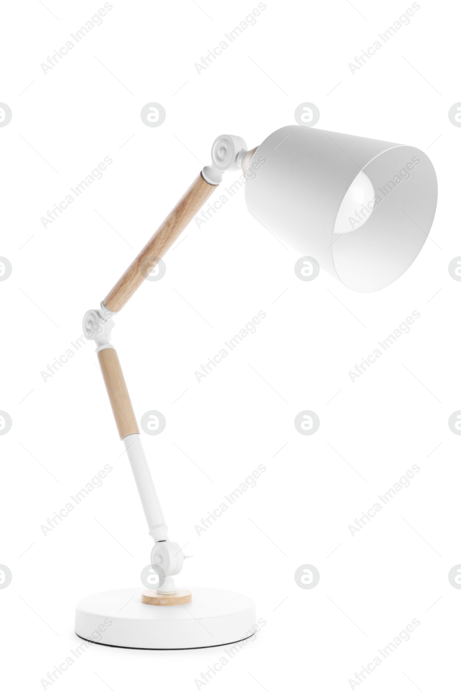 Stylish modern table lamp isolated on white Photo of Stylish modern table lamp isolated on white