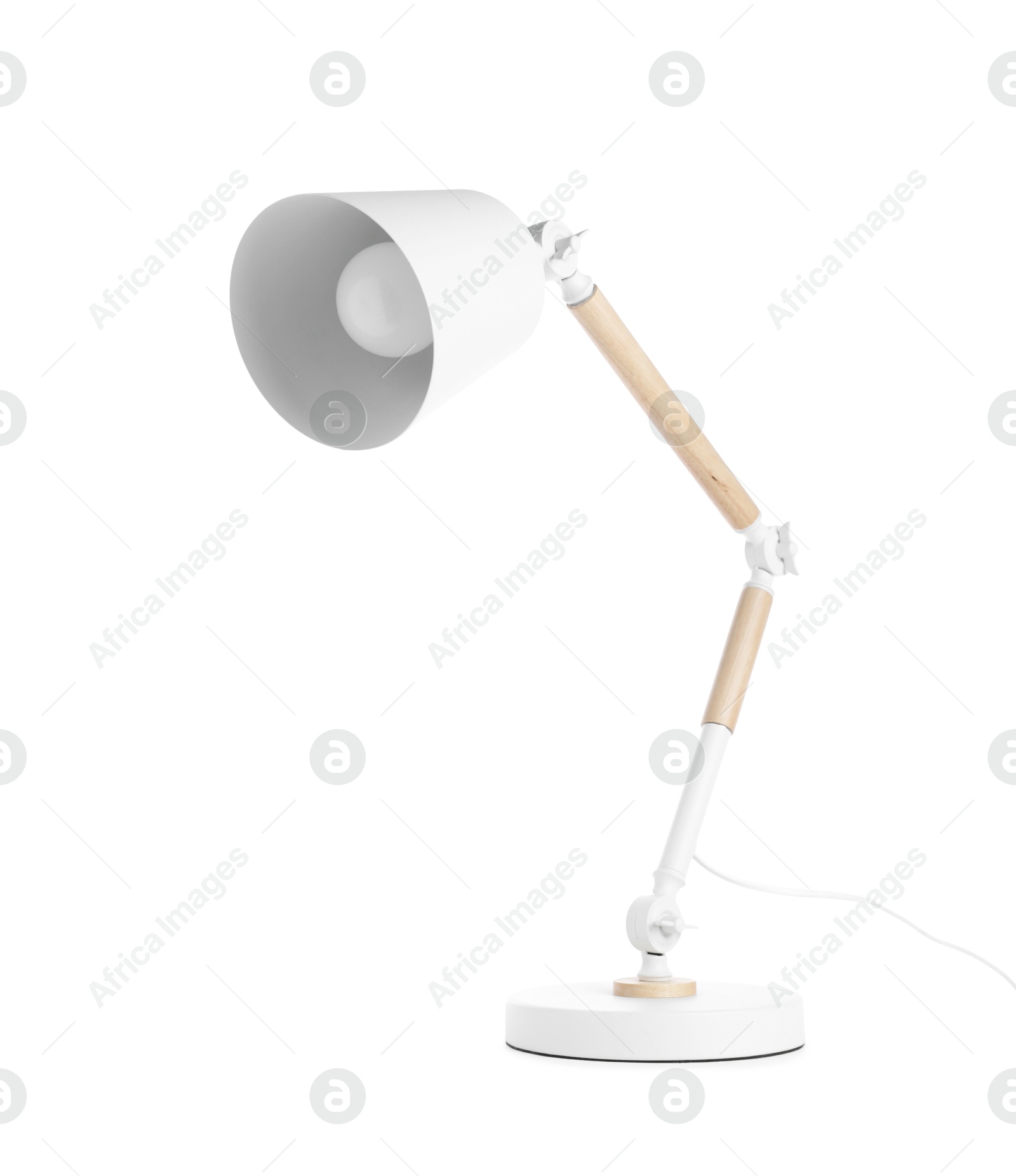 Stylish modern table lamp isolated on white Photo of Stylish modern table lamp isolated on white