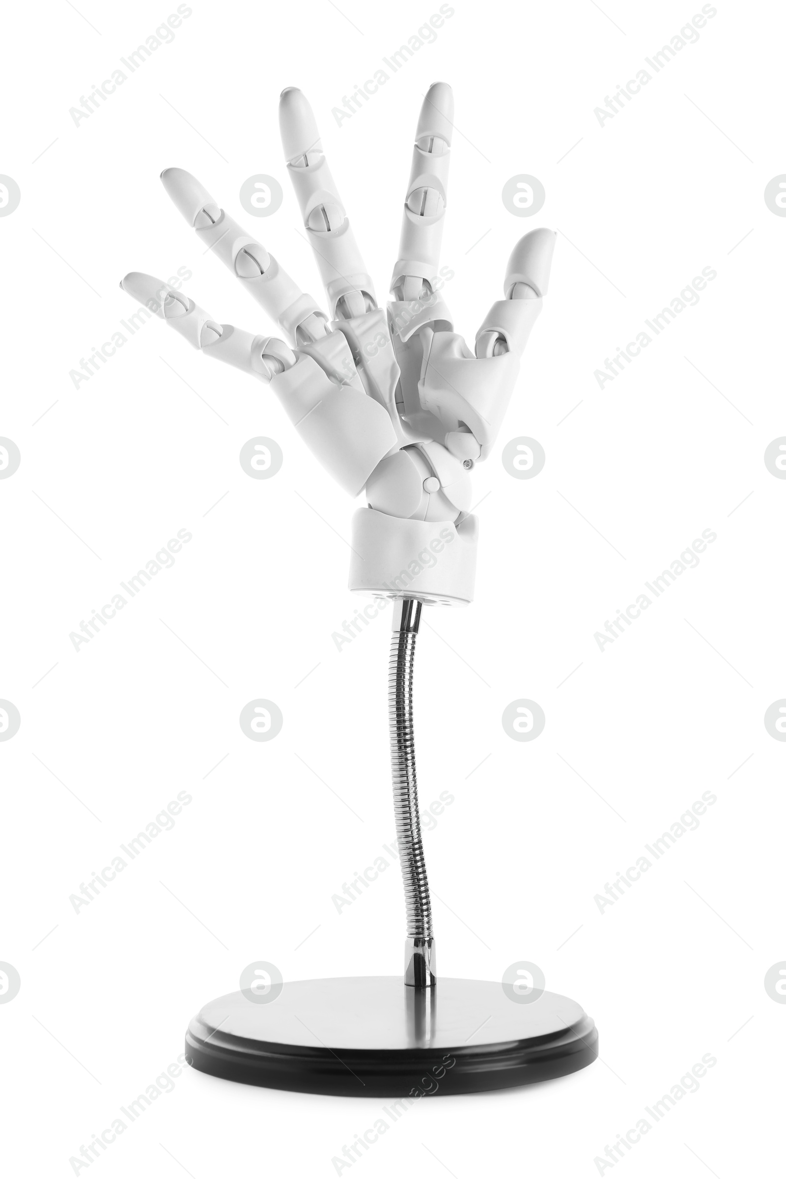 One mannequin hand on stand against white background Photo of One mannequin hand on stand against white background