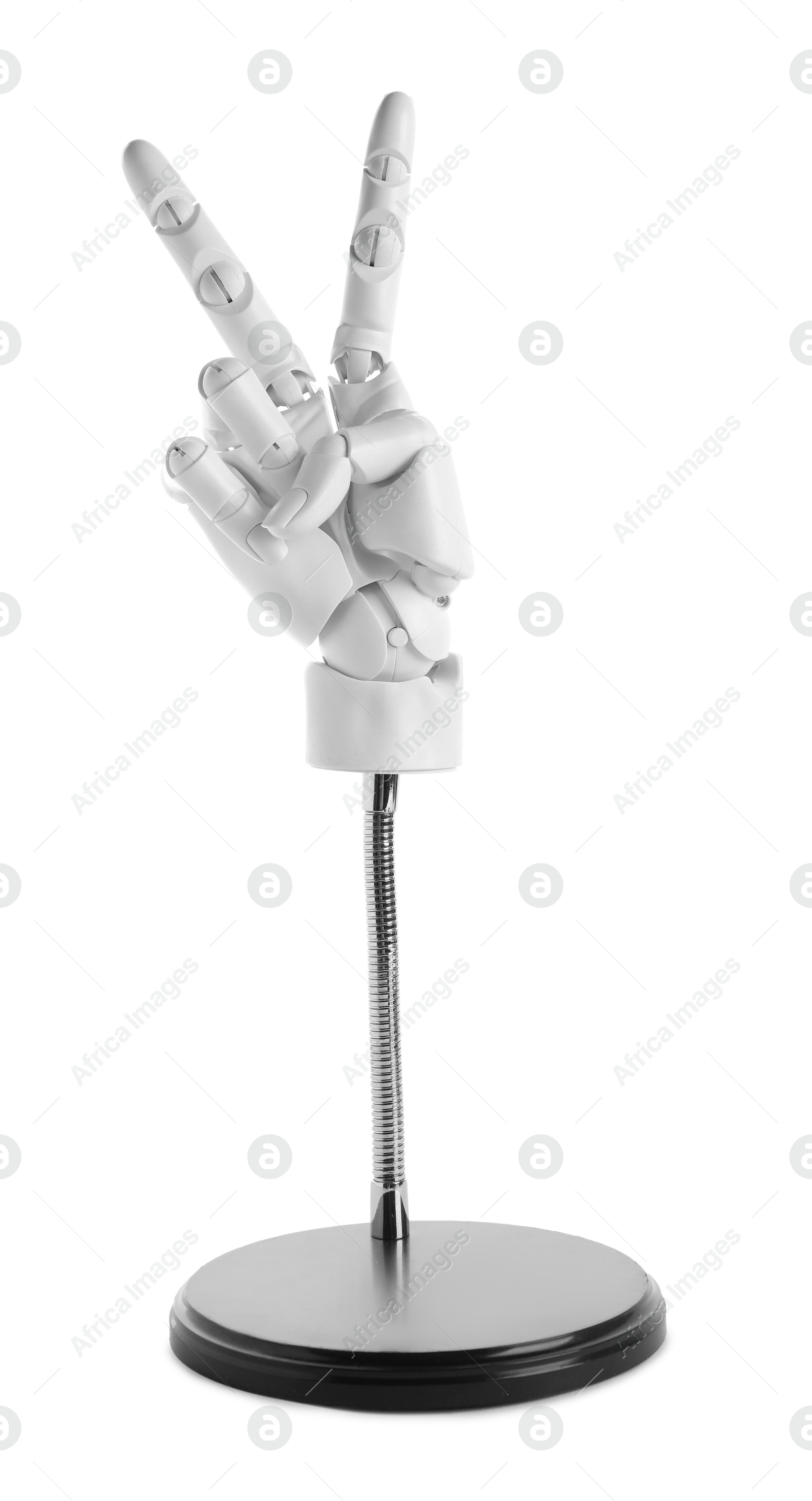 Mannequin hand on stand showing V-sign against white background Photo of Mannequin hand on stand showing V-sign against white background